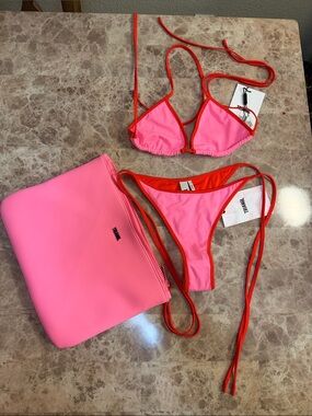 triangl swimwear Girls Neon Pink Bikini with Orange Trim and Pink Pouch